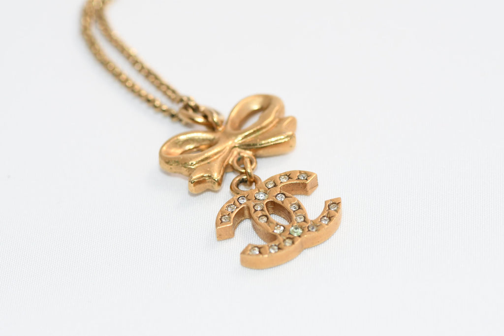 CHANEL Pendant Necklace Gold ribbon CC Logo silver rhinestone 06A