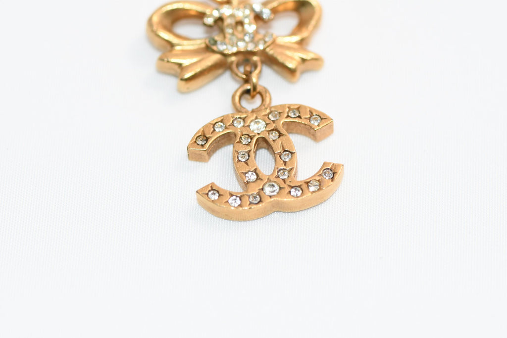 CHANEL Pendant Necklace Gold ribbon CC Logo silver rhinestone 06A