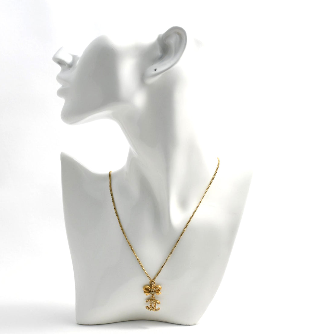 CHANEL Pendant Necklace Gold ribbon CC Logo silver rhinestone 06A