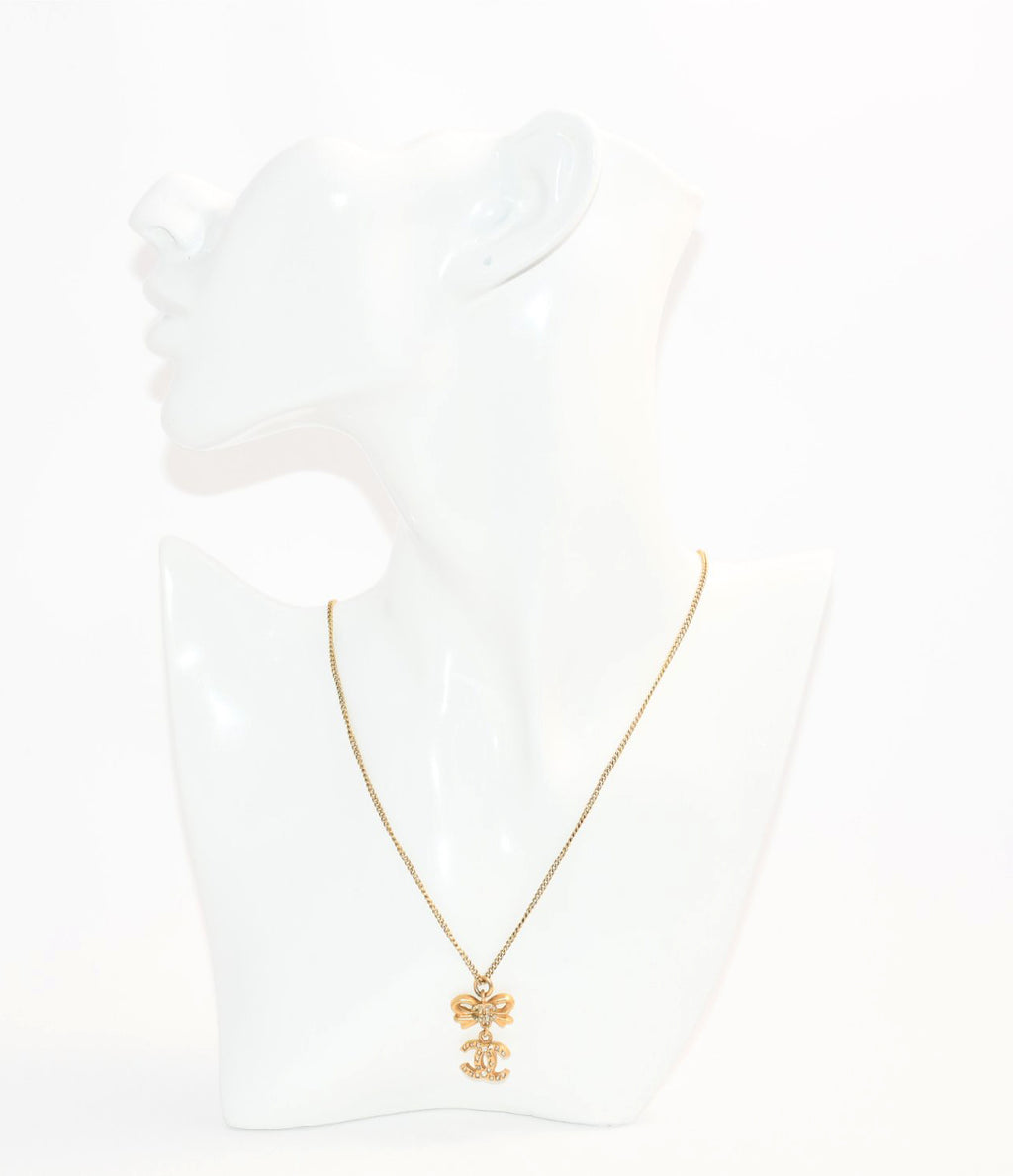 CHANEL Pendant Necklace Gold ribbon CC Logo silver rhinestone 06A