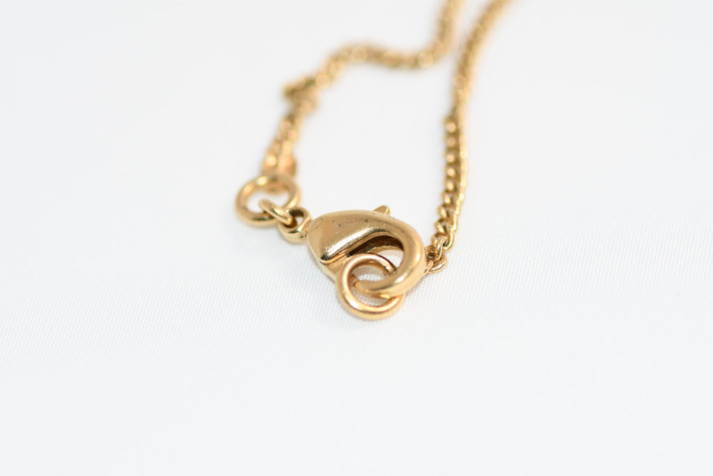 CHANEL Pendant Necklace Gold ribbon CC Logo silver rhinestone 06A