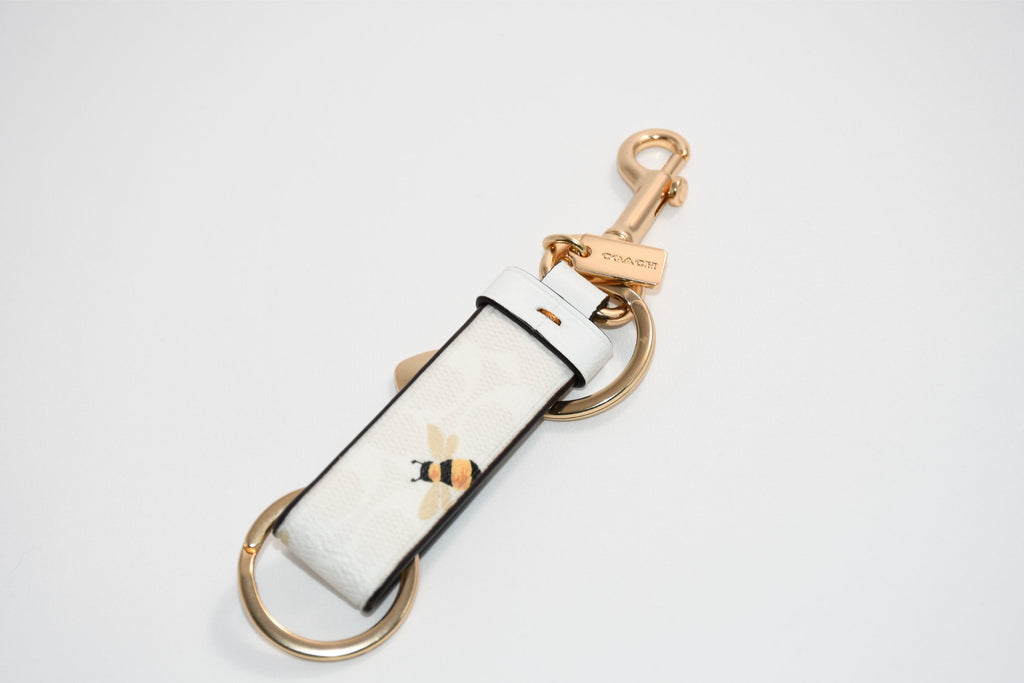 Coach Trigger Snap Bag Charm In Signature Canvas Honey Bee Print keychain