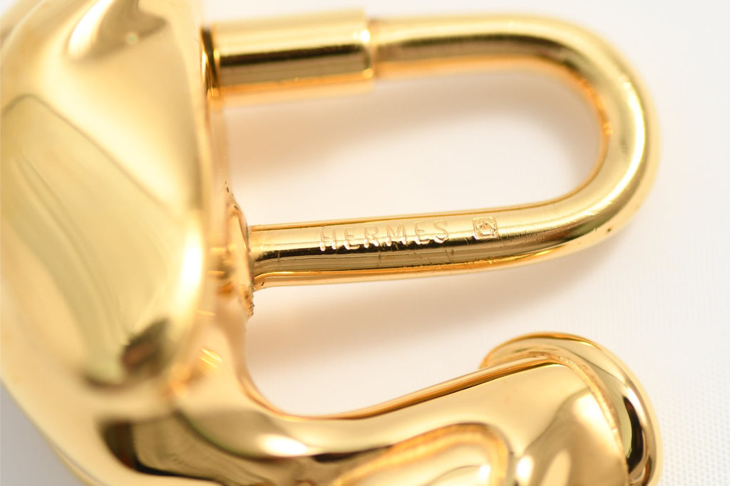 Hermes Cadena Pelican Gold motif bag charm lock 1992