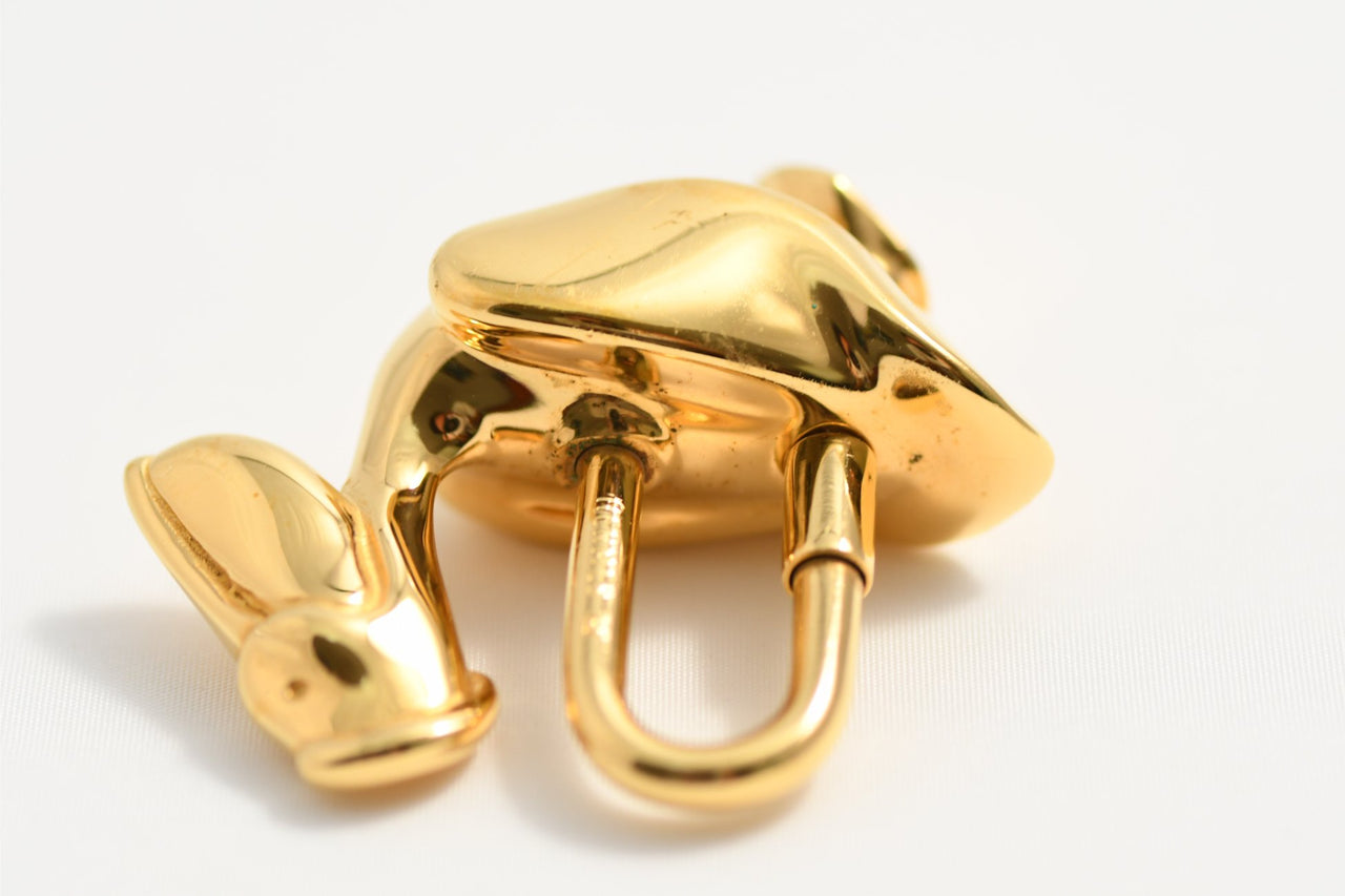 Hermes Cadena Pelican Gold motif bag charm lock 1992