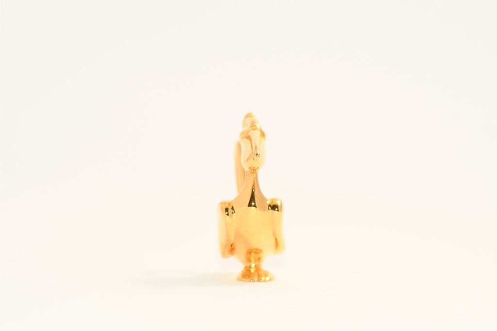 Hermes Cadena Pelican Gold motif bag charm lock 1992