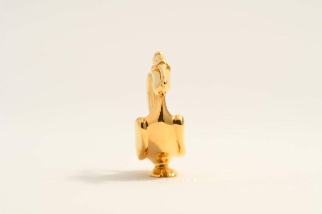 Hermes Cadena Pelican Gold motif bag charm lock 1992
