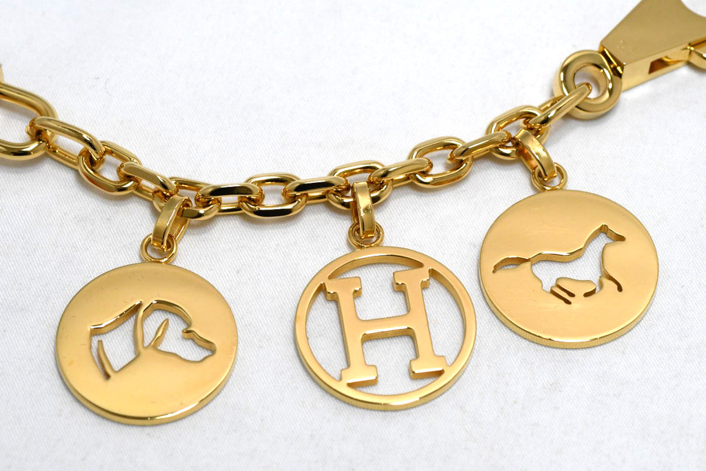 Hermes Gold Breloque Olga bag charm amulette Cadena berloque Excellent - MINT