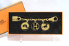 Hermes Gold Breloque Olga bag charm amulette Cadena berloque Excellent - MINT