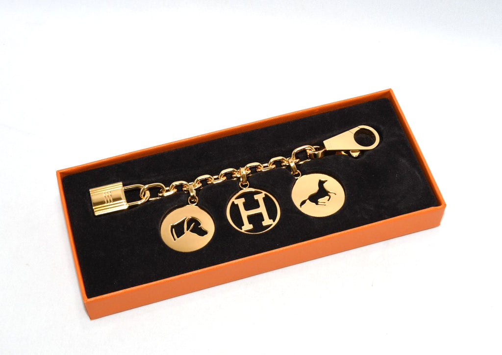 Hermes Gold Breloque Olga bag charm amulette Cadena berloque Excellent - MINT