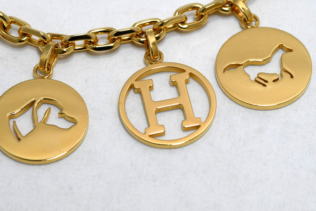 Hermes Gold Breloque Olga bag charm amulette Cadena berloque Excellent - MINT