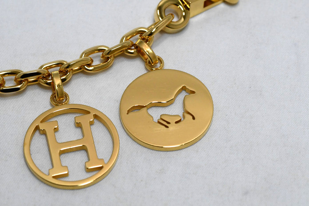 Hermes Gold Breloque Olga bag charm amulette Cadena berloque Excellent - MINT
