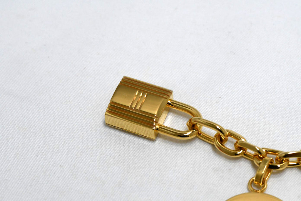 Hermes Gold Breloque Olga bag charm amulette Cadena berloque Excellent - MINT