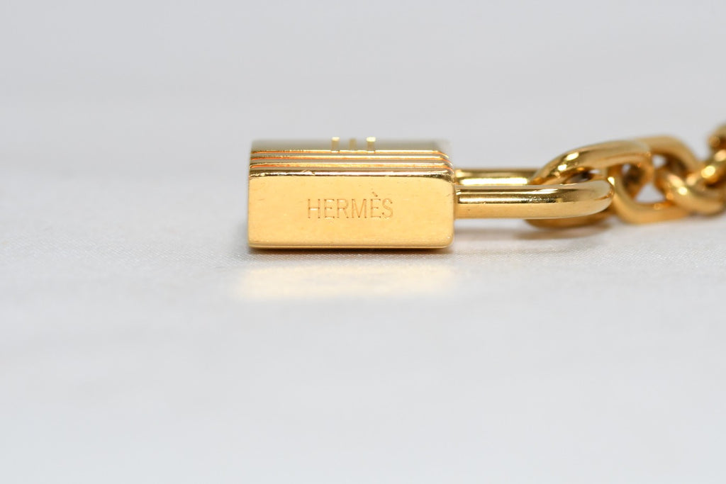 Hermes Gold Breloque Olga bag charm amulette Cadena berloque 0481