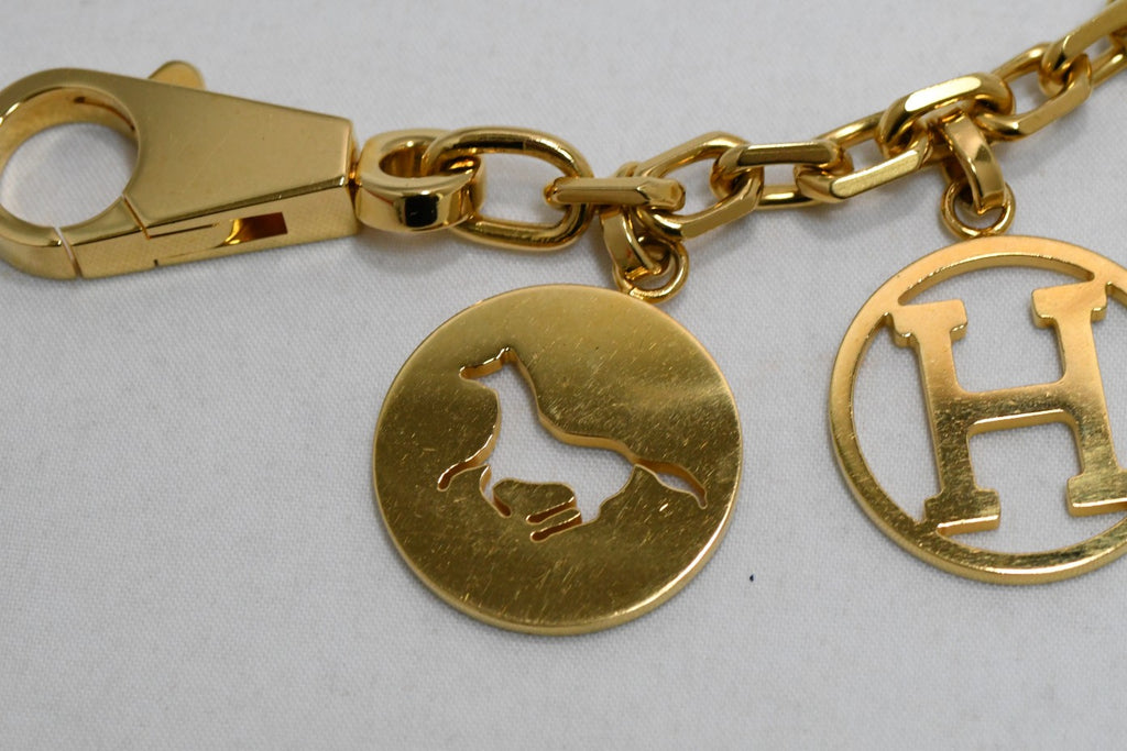 Hermes Gold Breloque Olga bag charm amulette Cadena berloque 0481