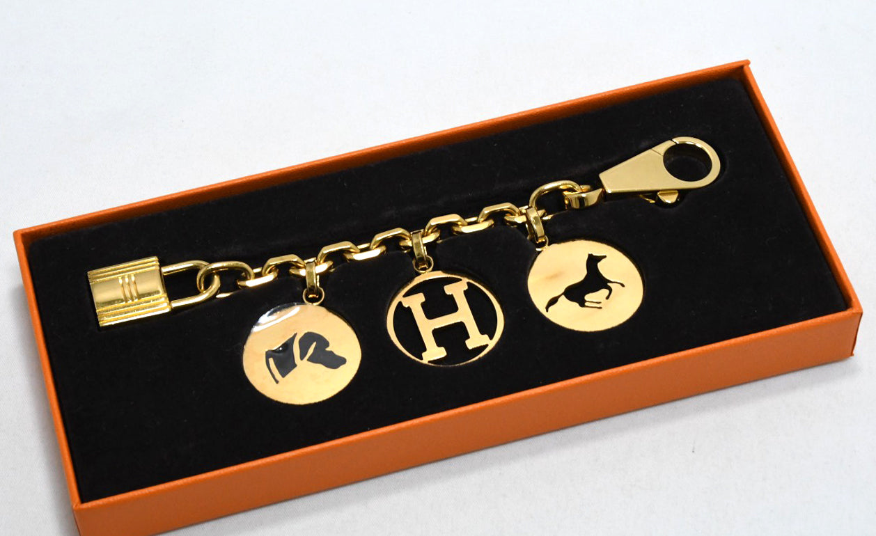 Hermes Gold Breloque Olga bag charm amulette Cadena berloque 0481