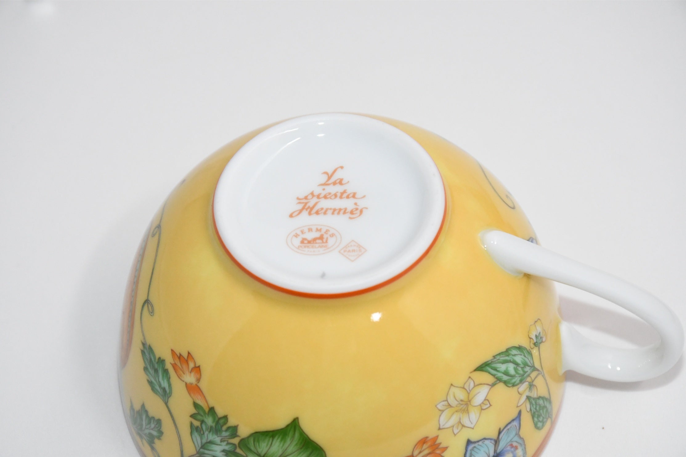 Hermes La Siesta Tea Cup and Saucer Set of 2 yellow porcelain