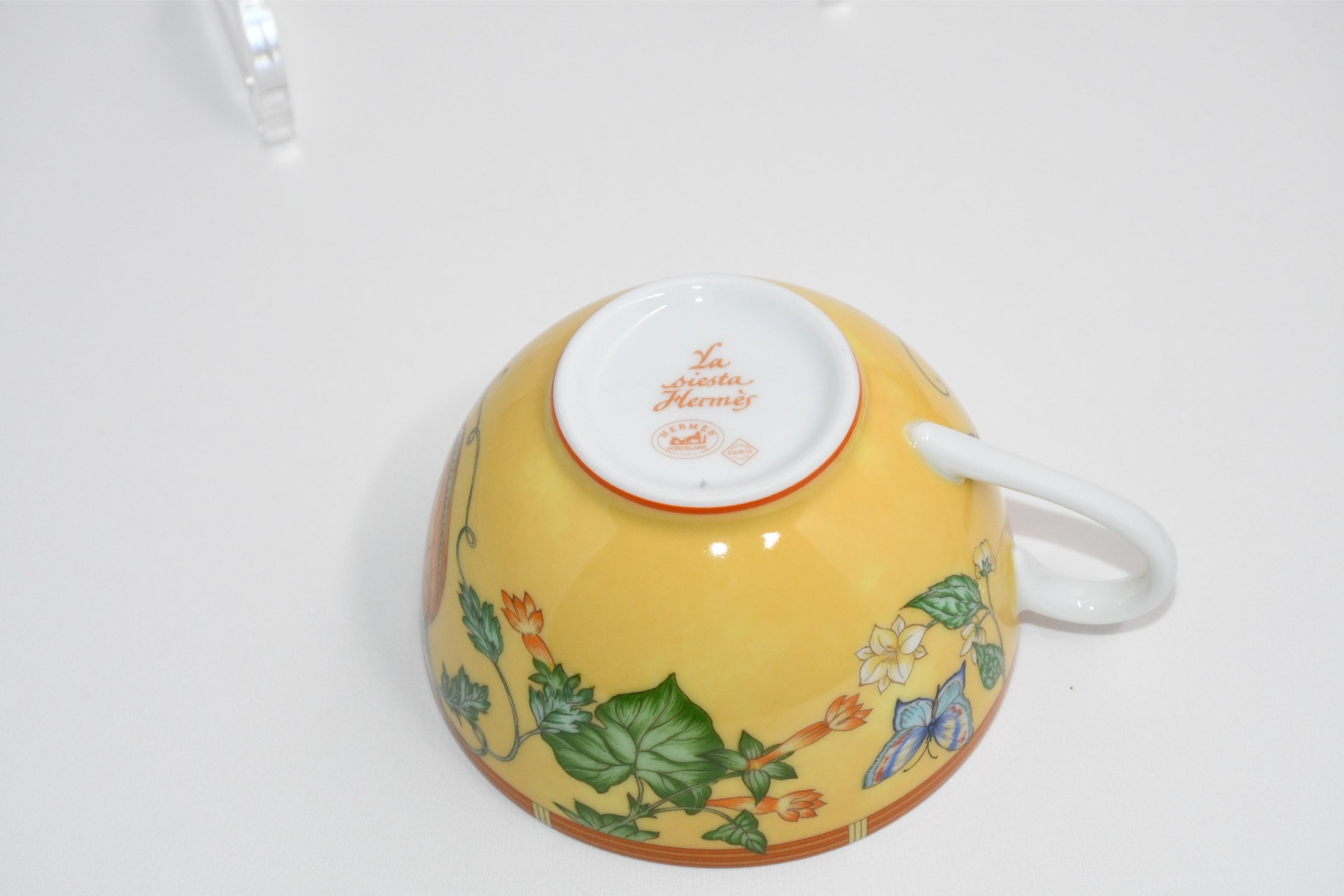 Hermes La Siesta Tea Cup and Saucer Set of 2 yellow porcelain