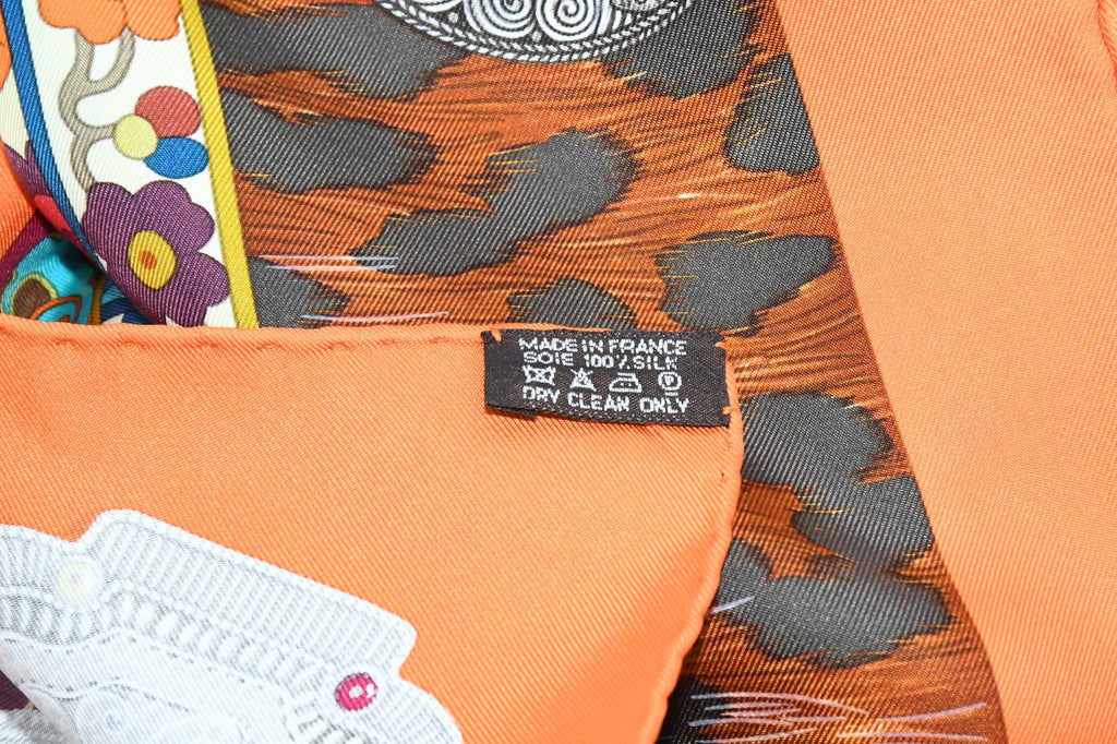 Hermes Scarf La Femme aux Semelles de Vent 90 cm silk orange Carre wind